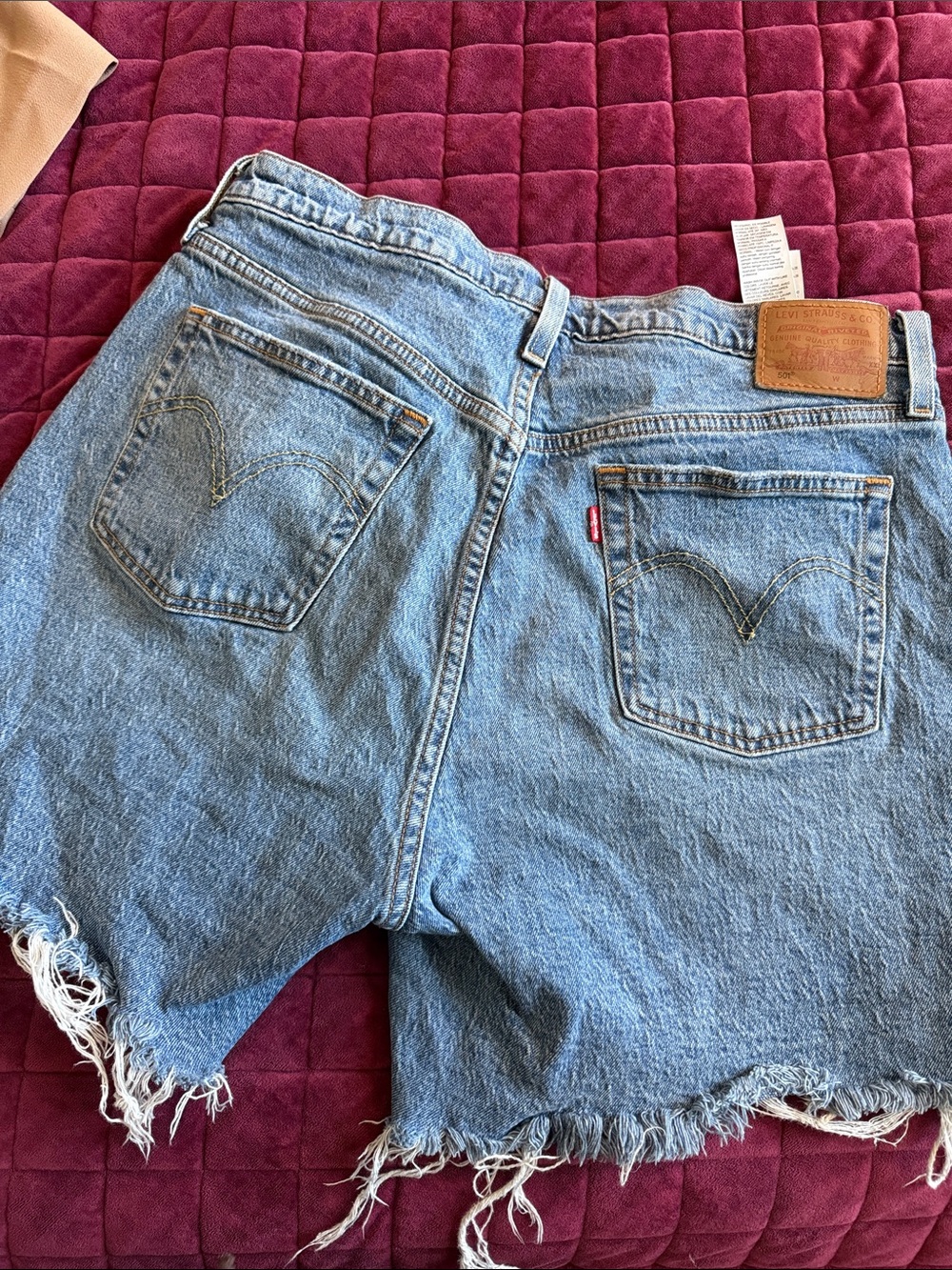 Levi's Light Blue Frayed Denim Cutoff Shorts